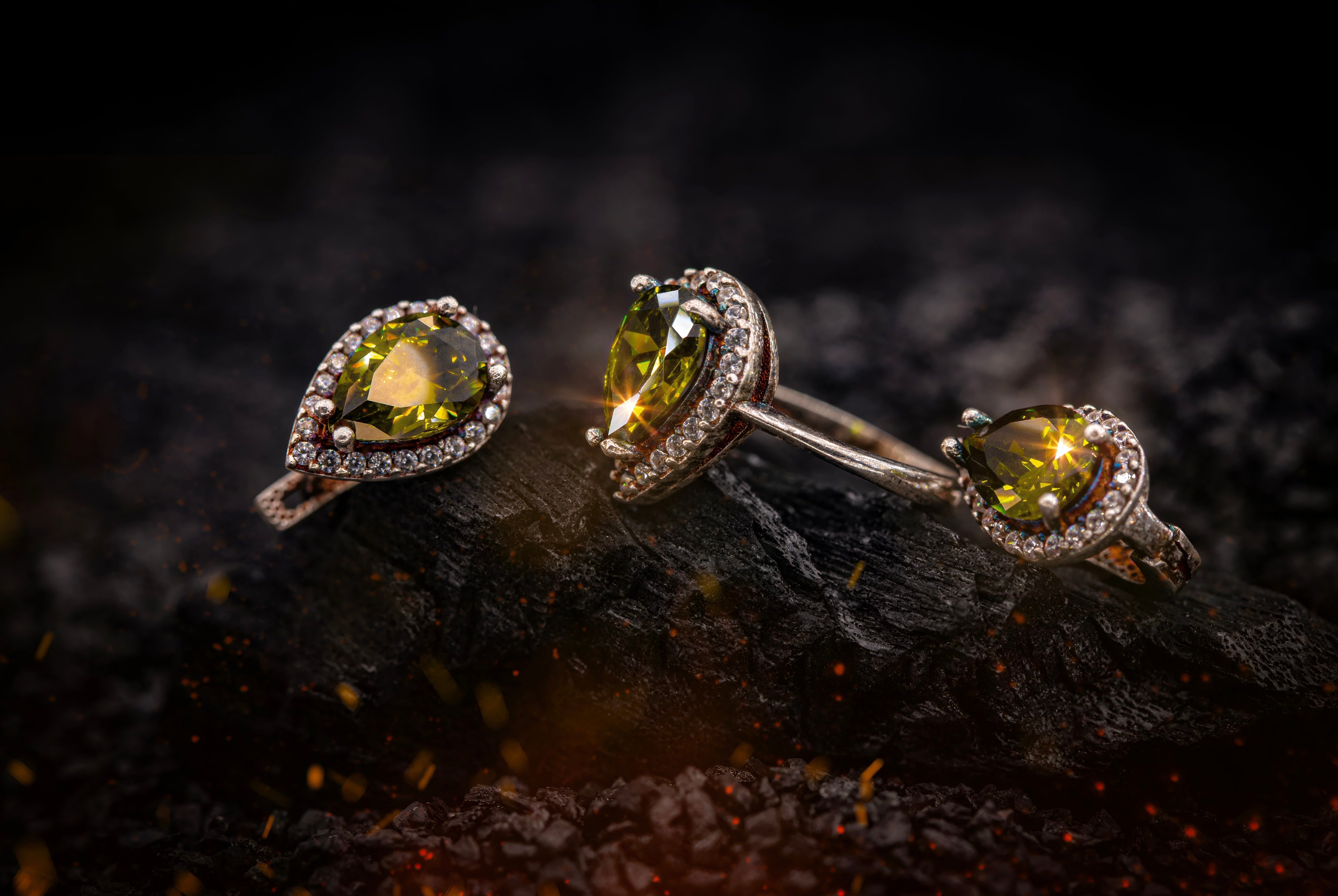 DEASTRA gemstone jewelry collection featuring rings with colored gemstones