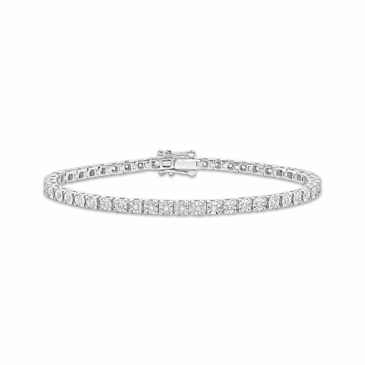 A tennis bracelet made of silver-toned metal with a row of clear round-cut stones, shown on a plain white background.