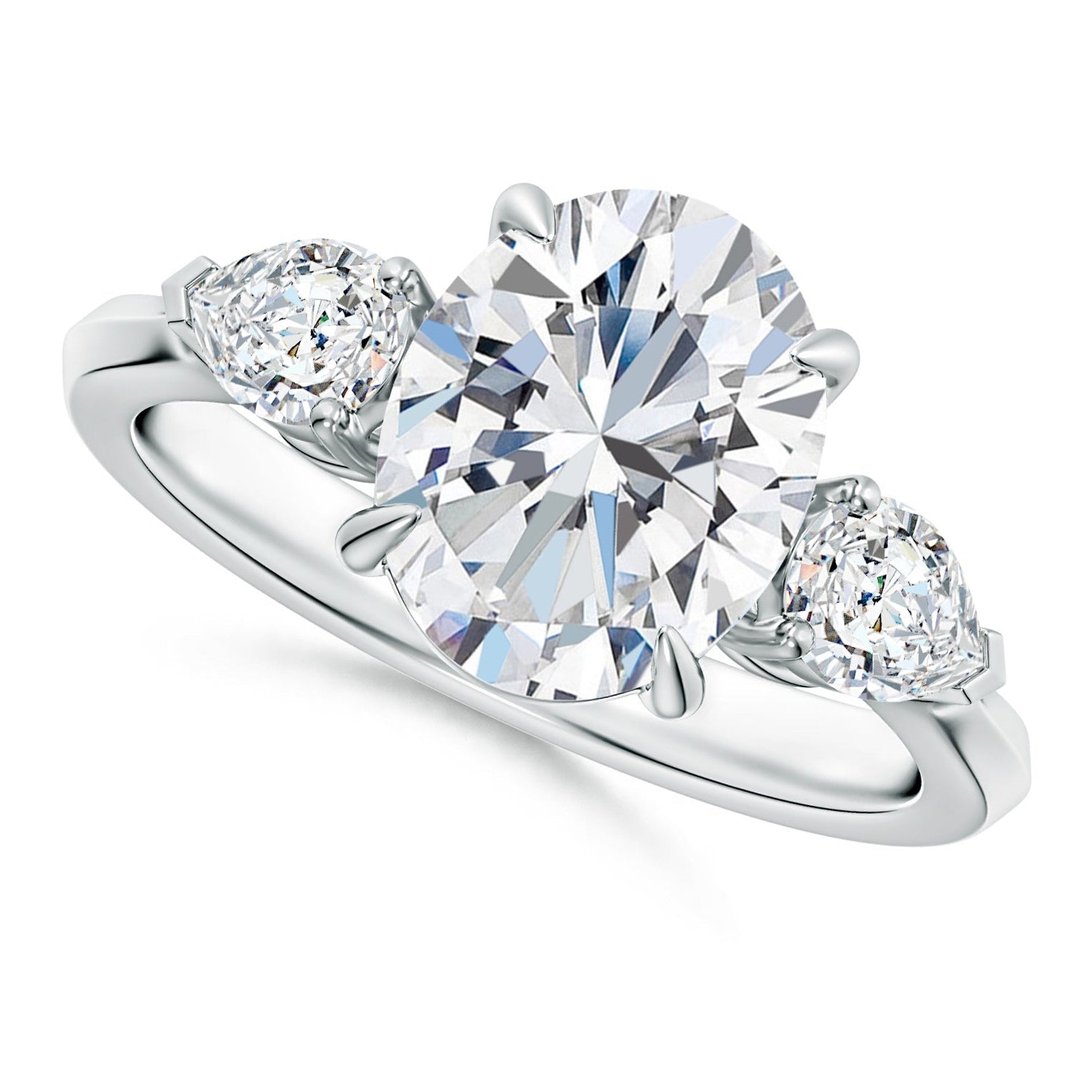 Pear Diamond and Oval Diamond Three Stone Engagement Ring