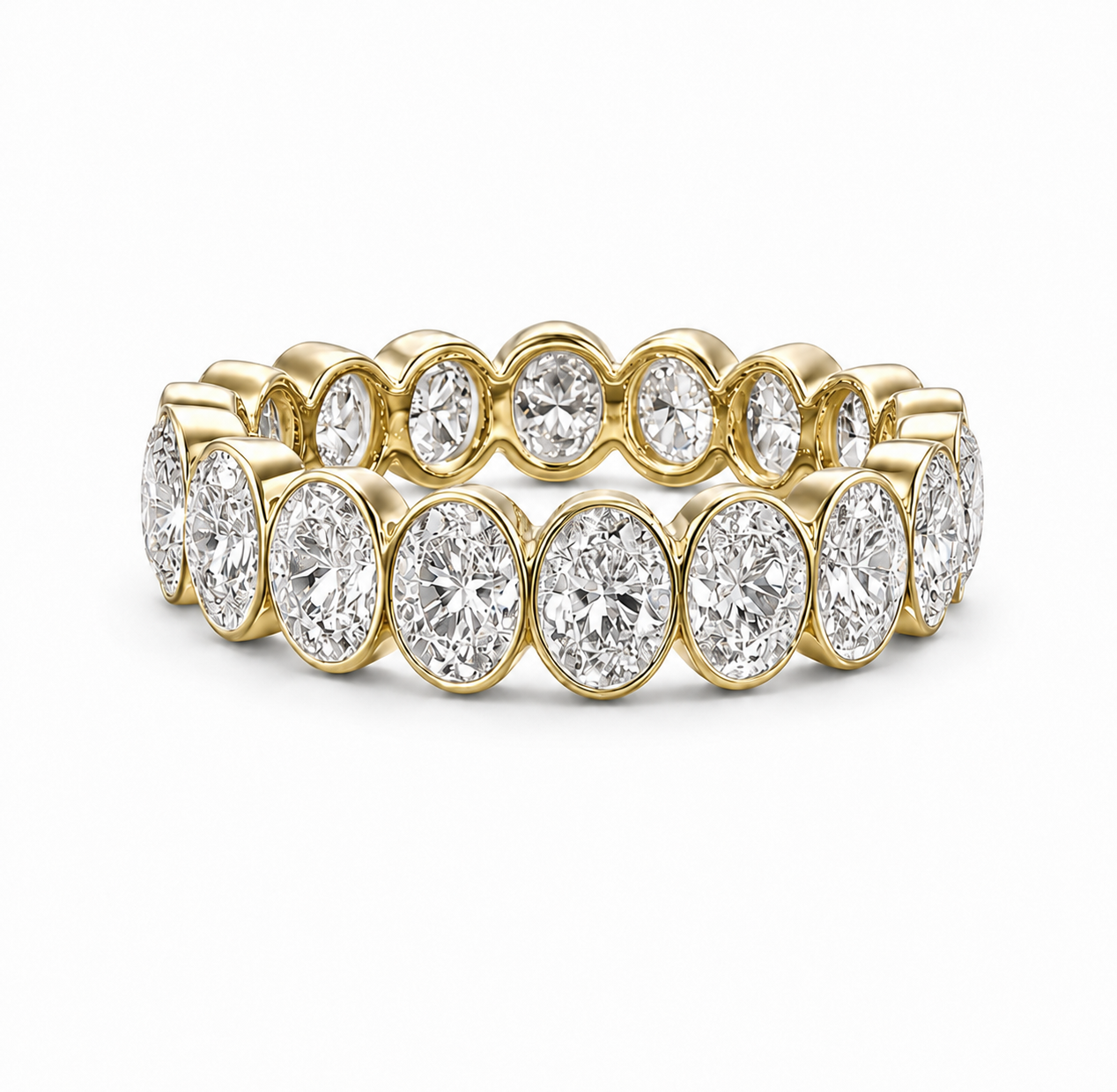 A yellow gold eternity band ring set with multiple round brilliant-cut diamonds, shown on a clean white background.