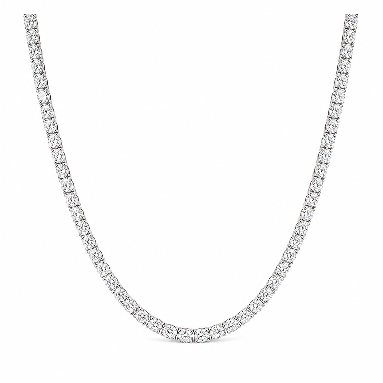 A tennis-style diamond necklace in a silver-tone setting, shown curved against a plain white background.Oval Diamond Tennis Necklace, 15 ct