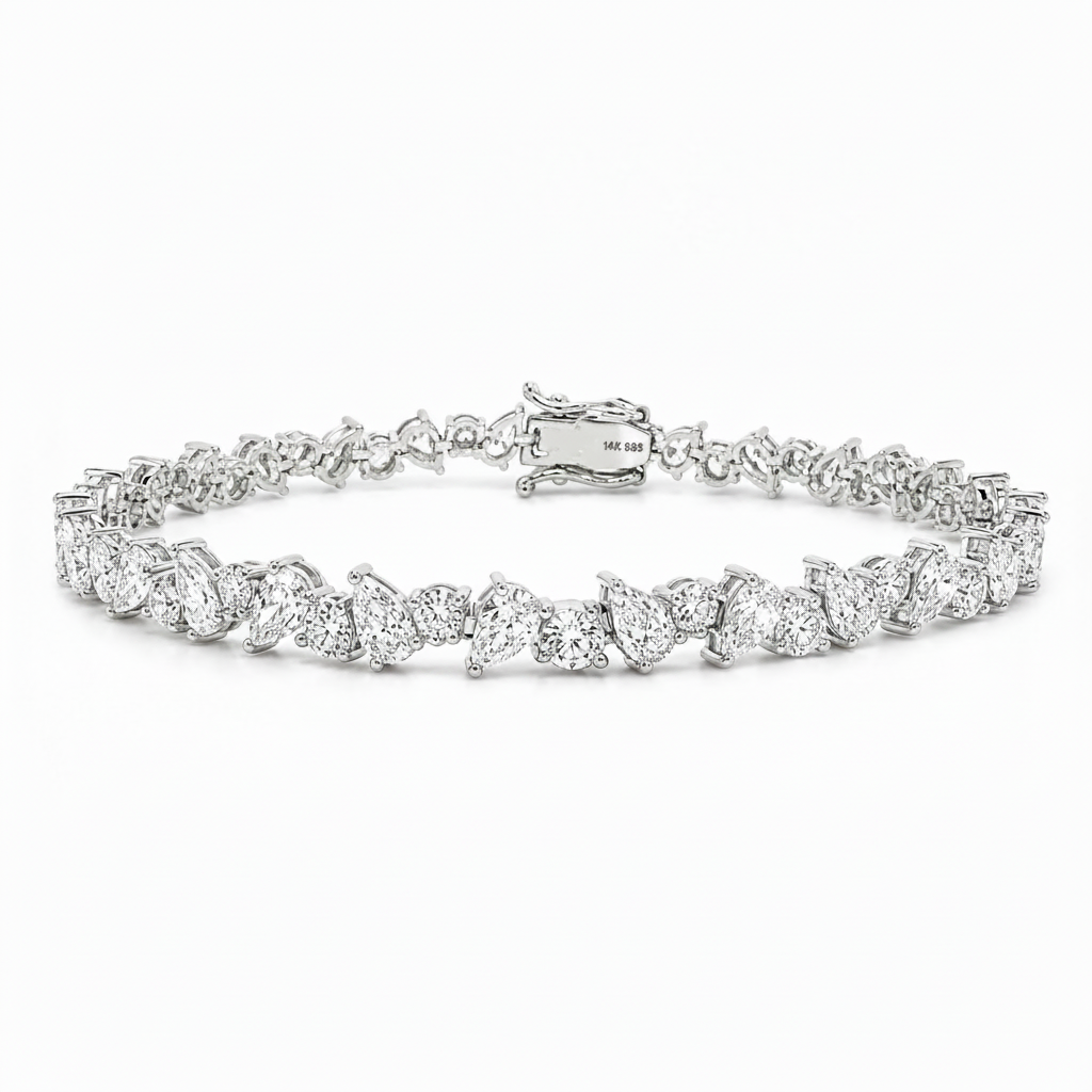 A diamond tennis bracelet in a silver-toned setting, arranged in a horizontal circle on a clean white background. The clasp is visible at the top center and features a small 'THE 818' hallmark.