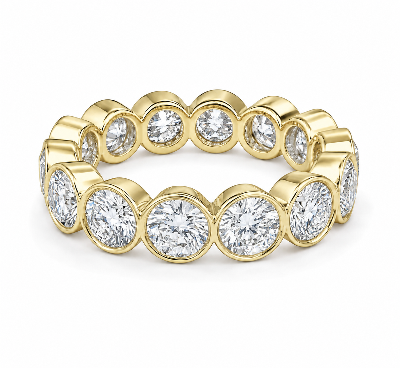 A yellow gold eternity band ring featuring a continuous row of round brilliant-cut diamonds in bezel settings, shown on a clean white background.