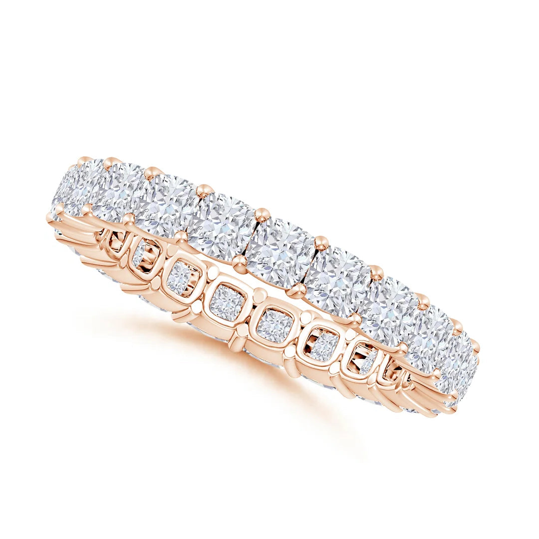 Rose gold ring with diamonds on a white background