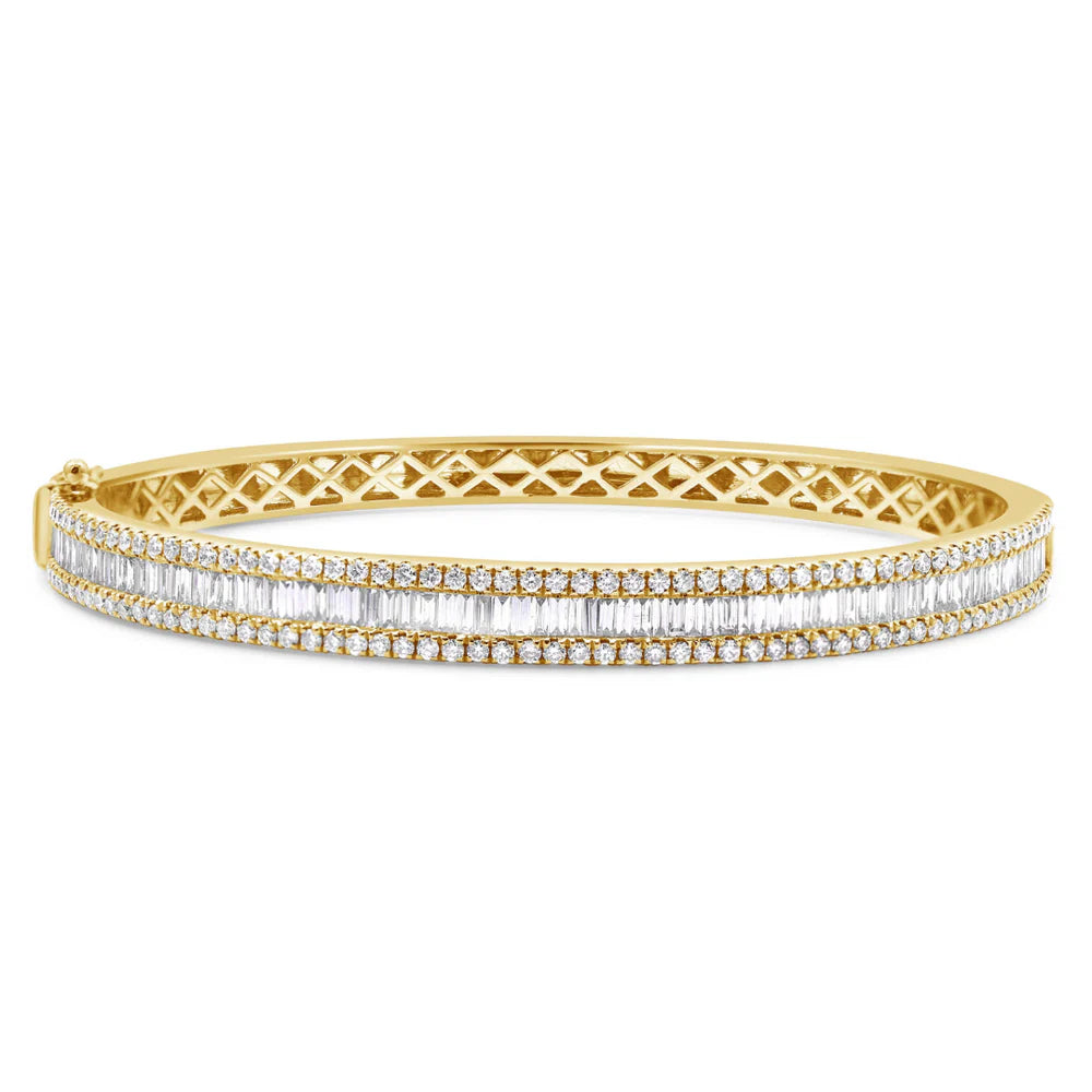 Gold bracelet with clear stones on a white background