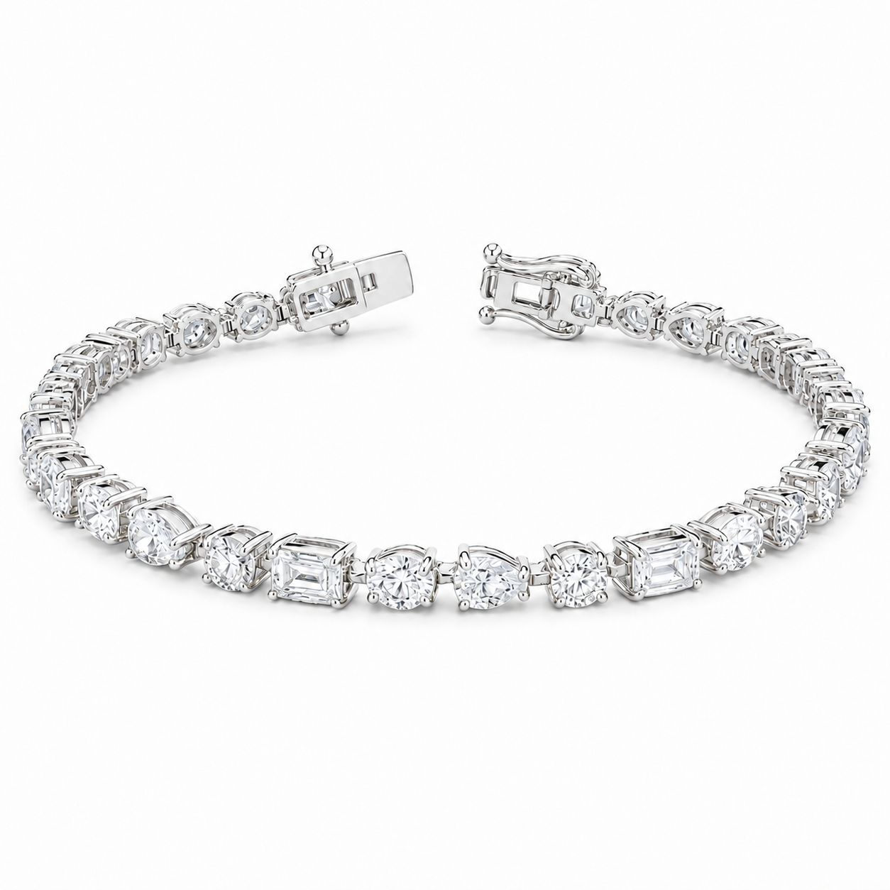 A diamond tennis bracelet in a silver-toned metal setting, featuring round and baguette-cut diamonds arranged in a continuous line with a clasp closure, shown on a plain white background.