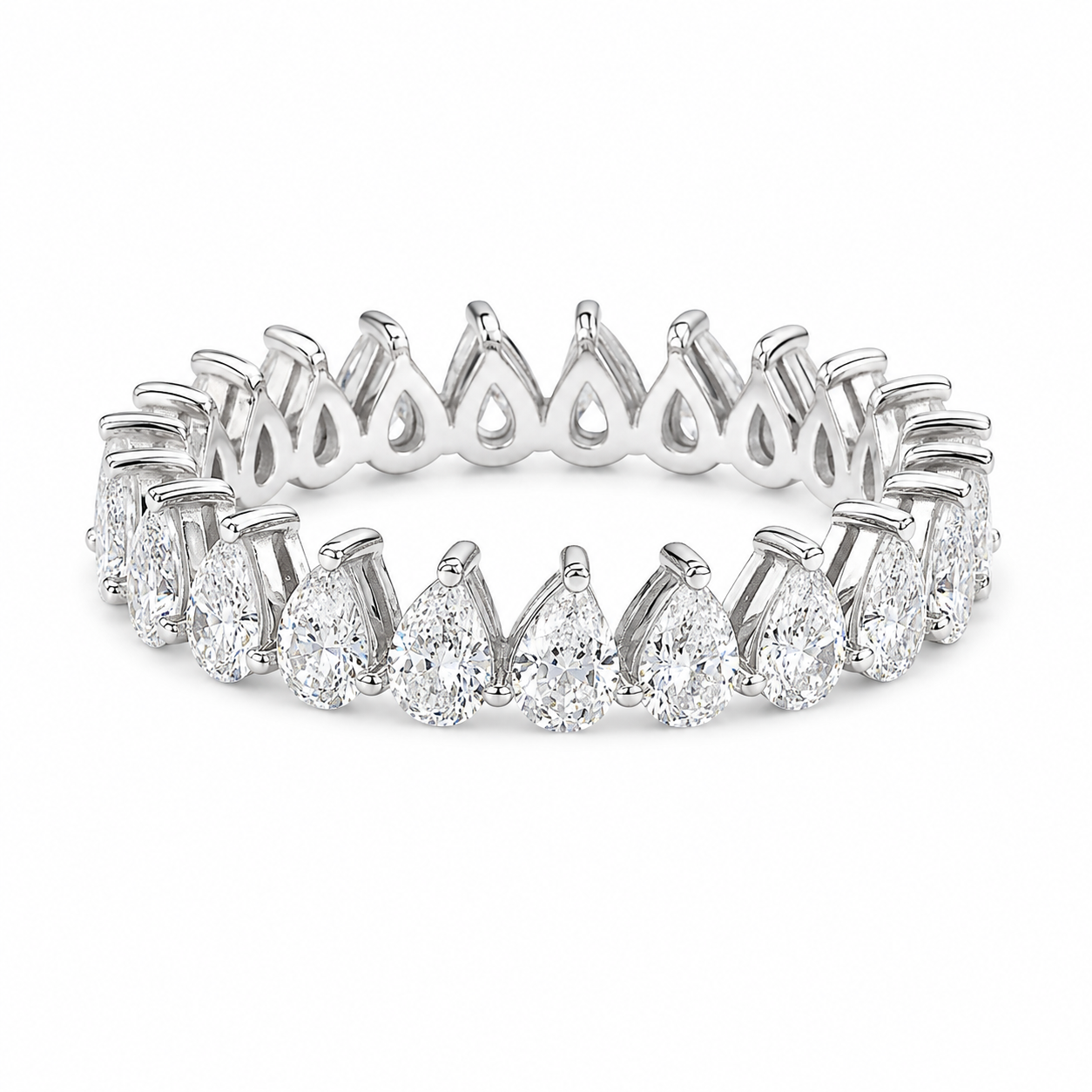 A 14k white gold diamond eternity band ring featuring a continuous row of pear-cut and round brilliant diamonds in a prong setting, shown on a clean white background.