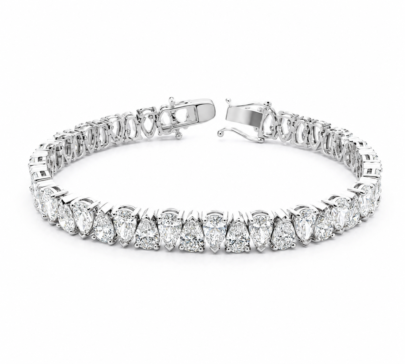A silver tennis bracelet featuring a row of marquise-cut and round brilliant-cut diamonds, shown on a clean white background.